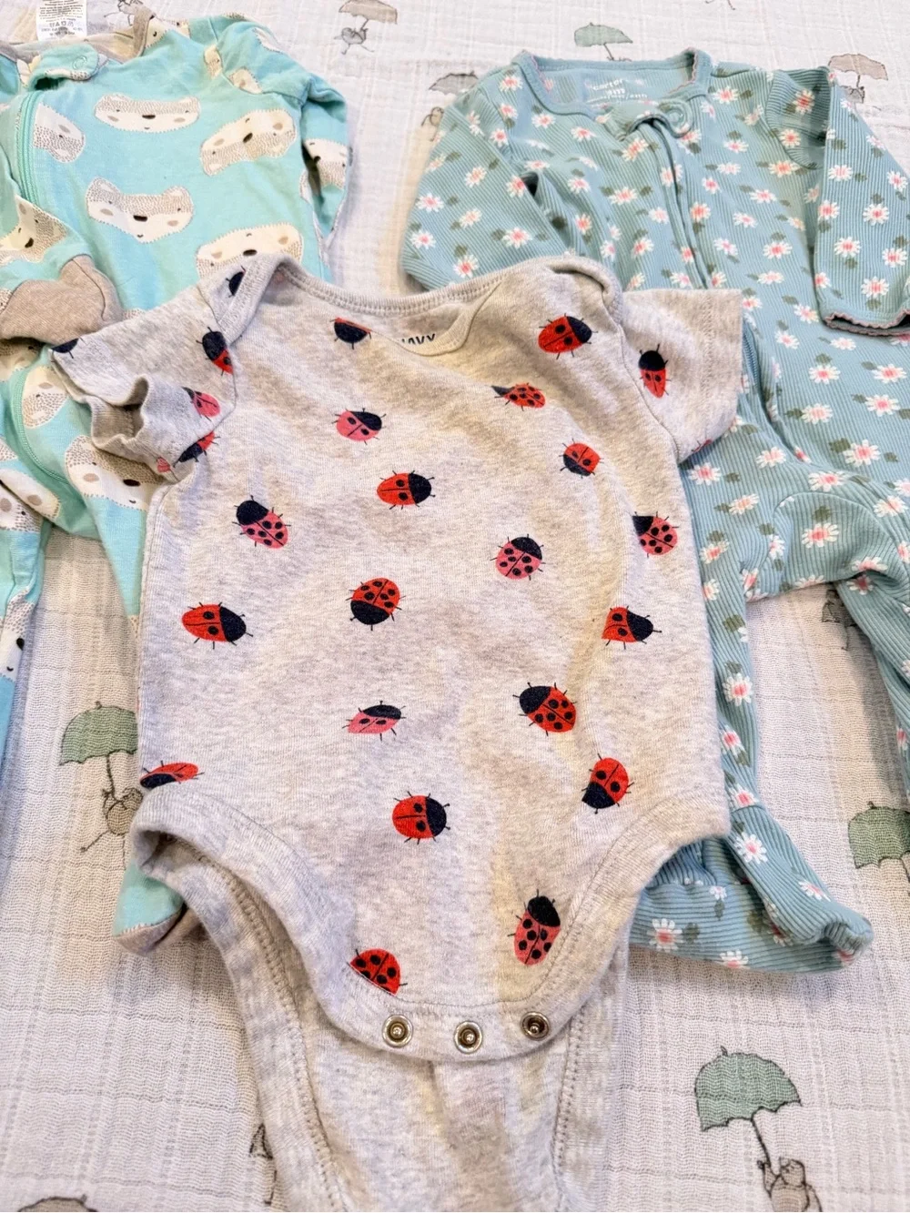 Bundle of 1 onesie and 2 footed sleepers